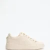 Ronii Debossed Peony Low-Top Sneakers