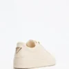 Ronii Debossed Peony Low-Top Sneakers